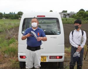 田植えの説明をする今川さんの写真